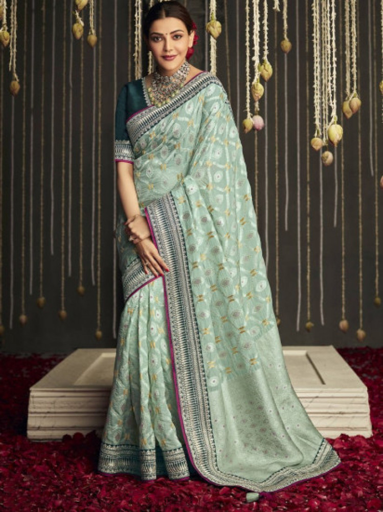 wonderful creamy green fancy silk embroidered wedding wear sareeun stitched 443049 m